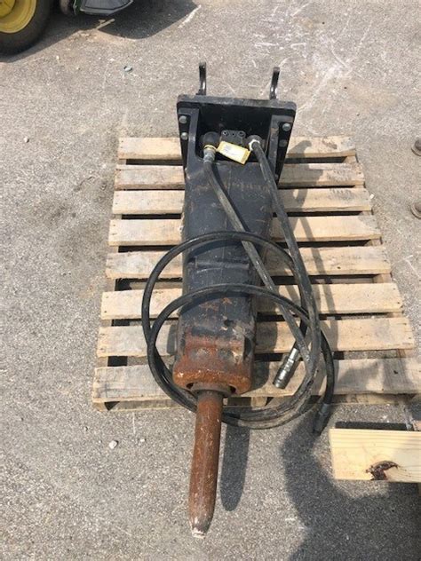 john deere jack hammer attachment